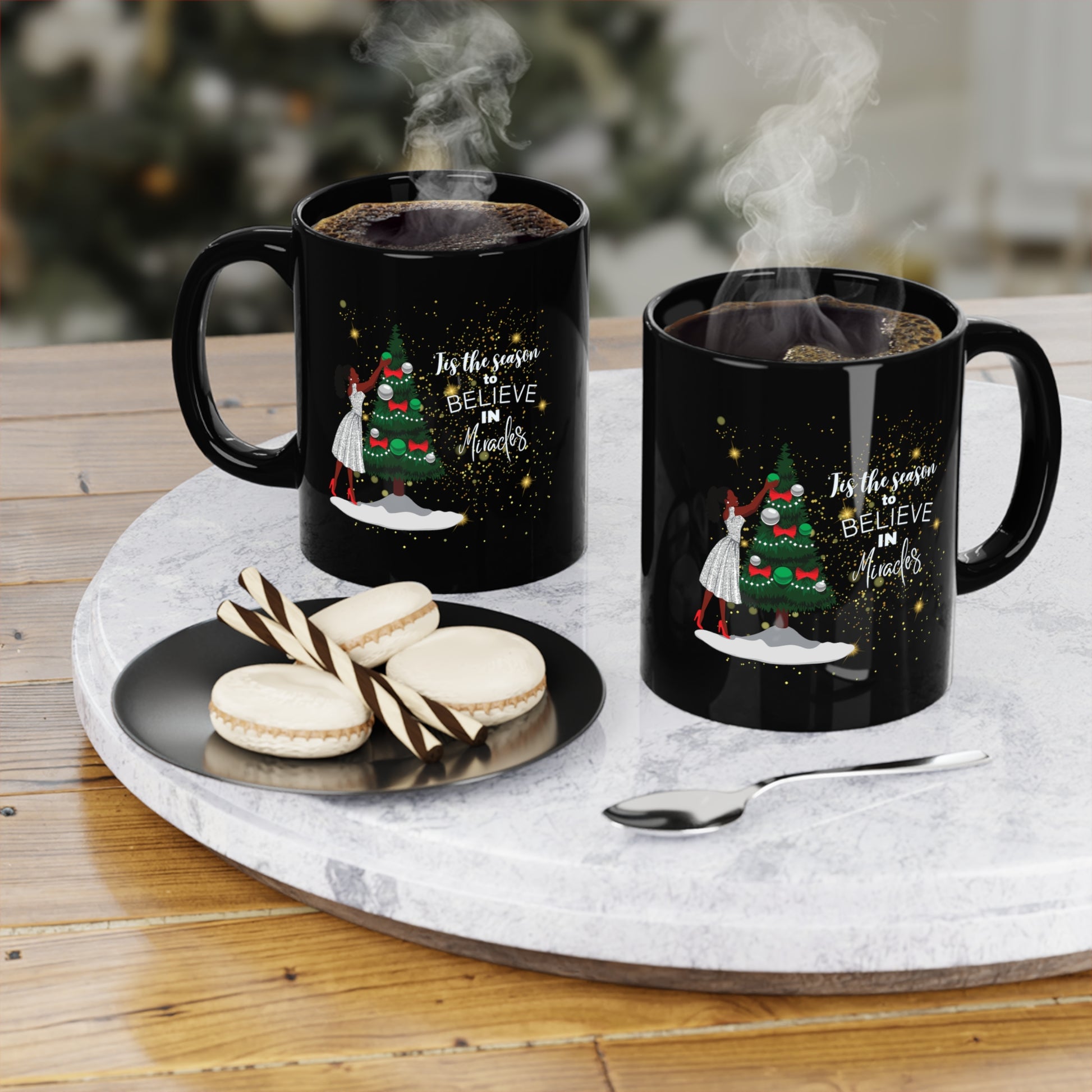 lifestyle view  of black coffee mug with African American Woman celebrating christmas, decorating a Christmas tree. African American Christmas decorations. 