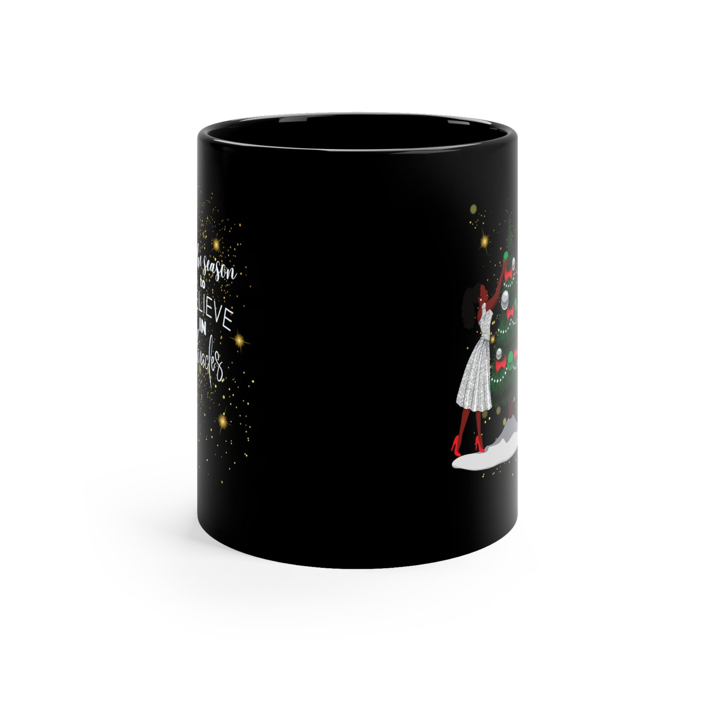 Side view of black coffee mug with African American Woman celebrating christmas, decorating a Christmas tree. African American Christmas decorations. 